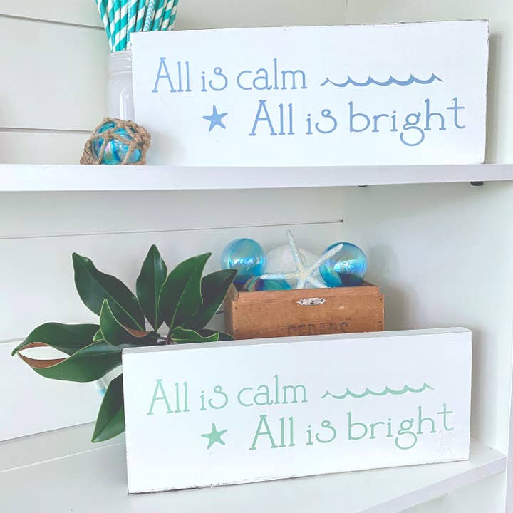 All is Calm Beach Sign coastal Christmas decor beach holiday for wholesale by Anchored Soul Designs