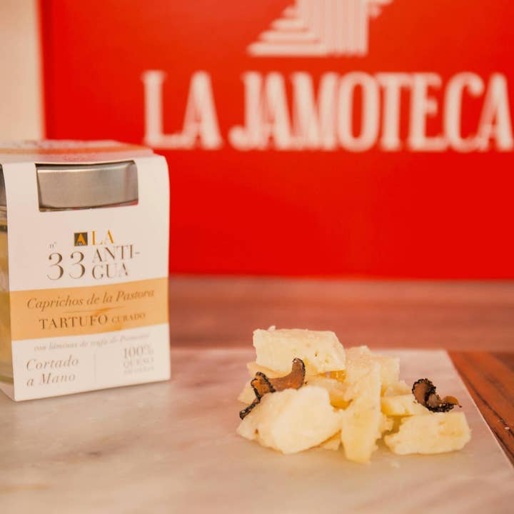 Sheep’s Milk Aged Cheese with White Truffle for wholesale by Number One Caviar LLC