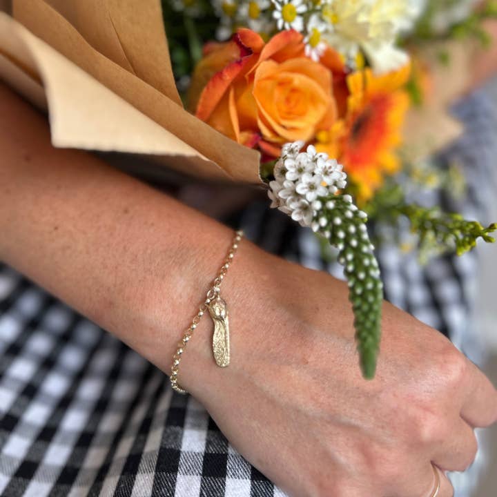 9ct Gold Sycamore Gap Seed Bracelet for wholesale by Kirsty Taylor Goldsmiths