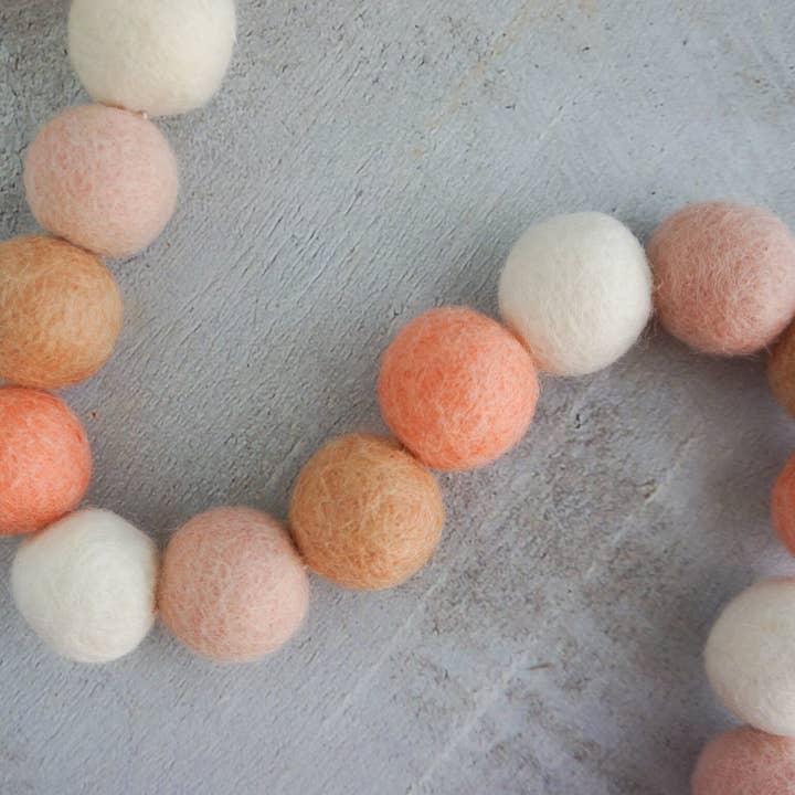 Perzik Pom Pom Slinger voor wholesale door AKUKU