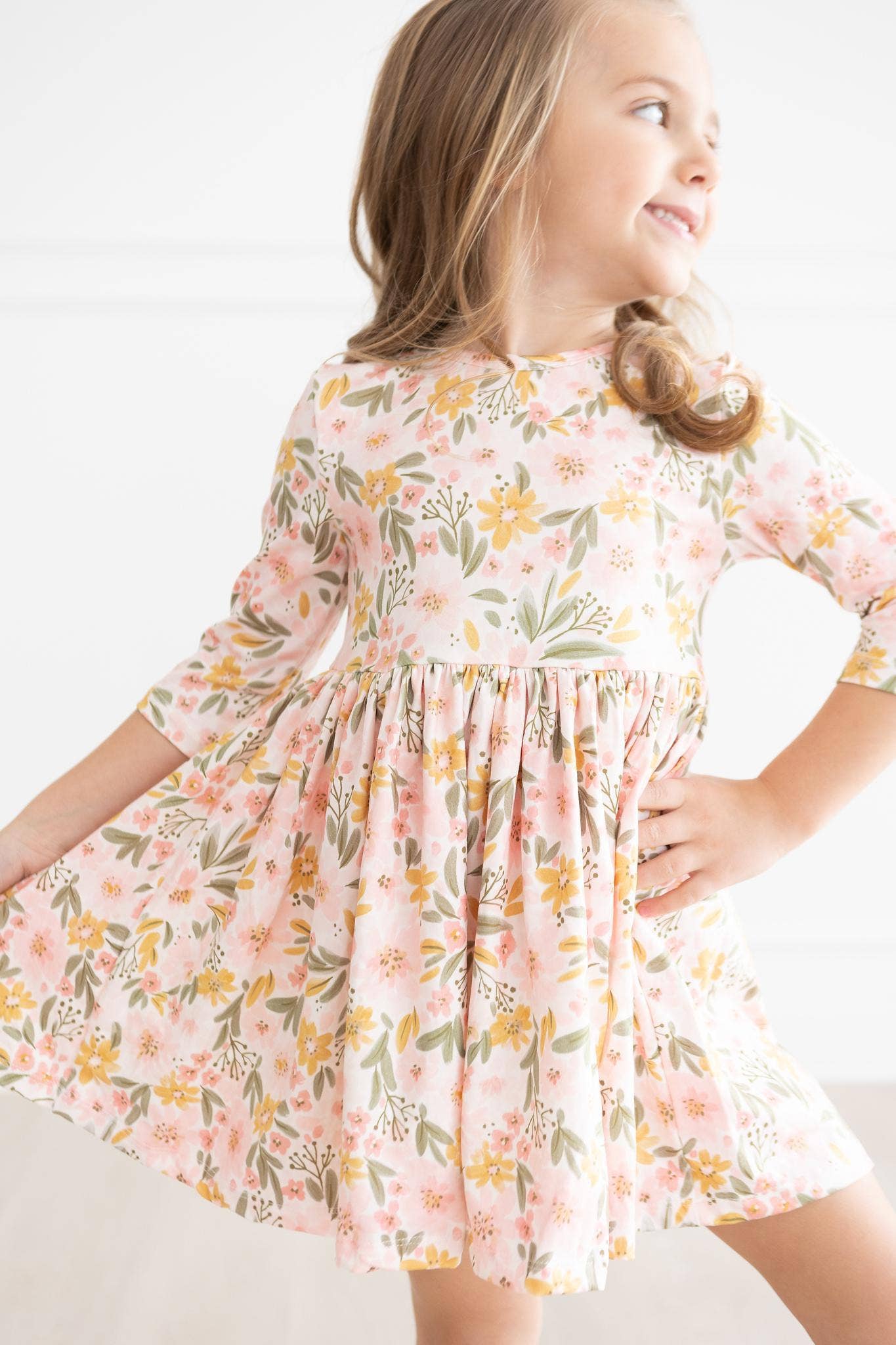 Mila & Rose - Wholesale Dress - Kids - Pretty Peachy 3/4 Sleeve Pocket Twirl Dress1
