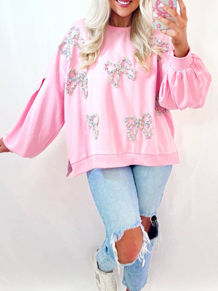 Light Pink Embroidered Bow Lantern Sleeve Oversized Pullover Sweatshirt for wholesale on Faire0