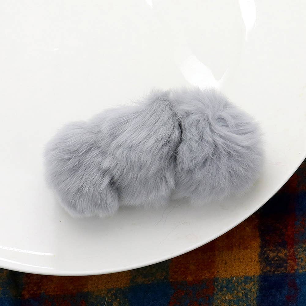 Sensibling Corp. - Vente Barrette – femme - Barrette à trois pompons en fausse fourrure0