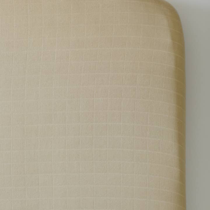 Sand Solid Bamboo Muslin Crib Sheet for wholesale by Lil North Co