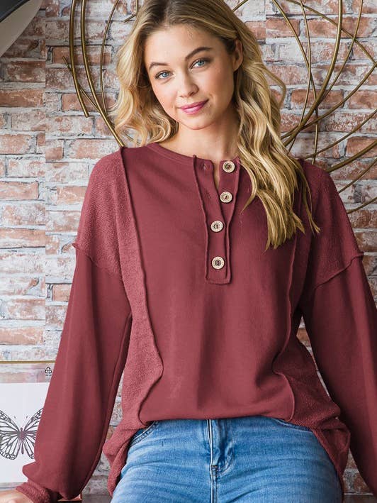 ET7338-10 TOP DE MANGA ABULLONADA SÓLIDO CON CONTRASTE Y BOTÓN para venta al por mayor de HEIMISH