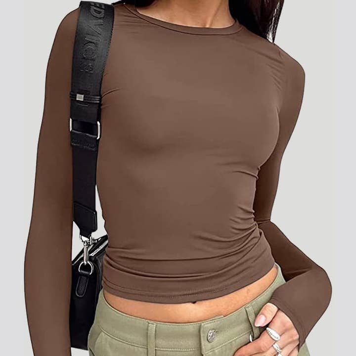 Top corto de manga larga con cuello redondo y otras tendencias de Resultados para top crop al por mayor. Devoluciones gratuitas y condiciones de pago a 60 días en Faire en Faire.