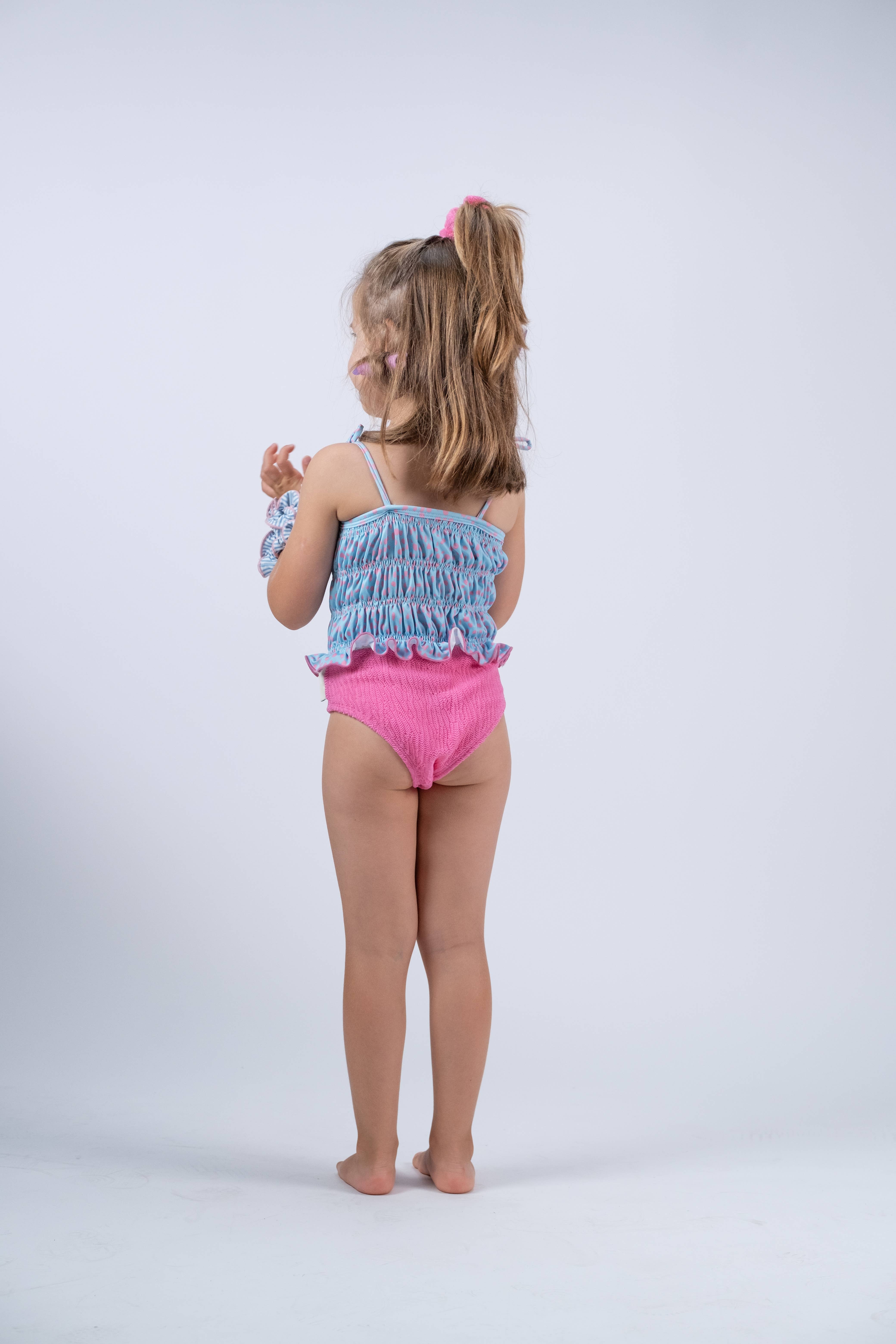 Paperboat – Engroshandel Badedragt - Børn – Badedragt til piger med lyserøde prikker og flæser1