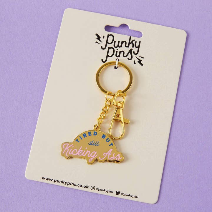 Tired But Kicking Ass Enamel Keyring for wholesale by Punky Pins
