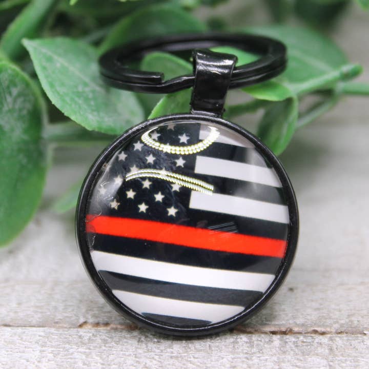 Red Line Flag Round Keychain for wholesale by Hylidae Boutique