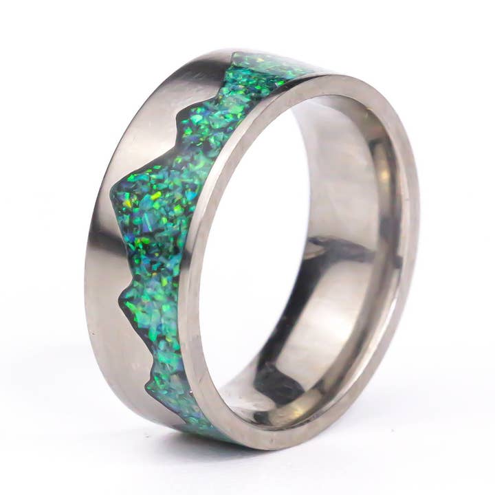 The Waking Mountain Titanium Ring, Green Fire Opals for wholesale by Natural Evolution Design