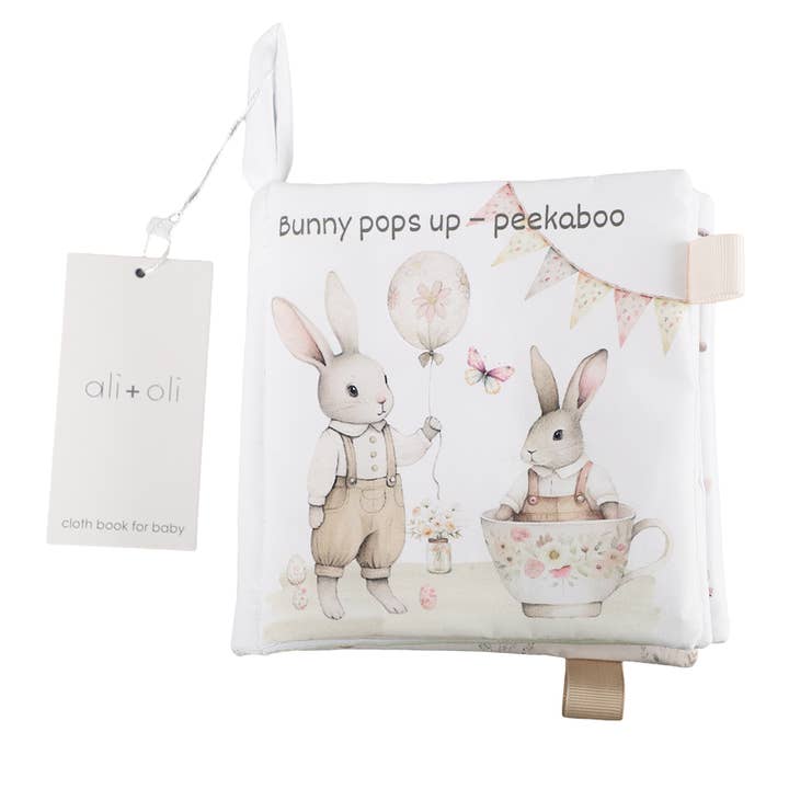 Happy Easter 10-Page Crinkle Soft Cloth Baby Book Taggies for wholesale by Ali+Oli
