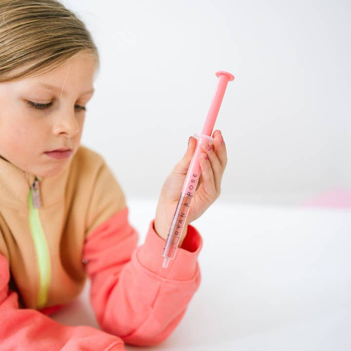 Lollipop Cutie Dose (oral liquid dispenser) for wholesale on Faire