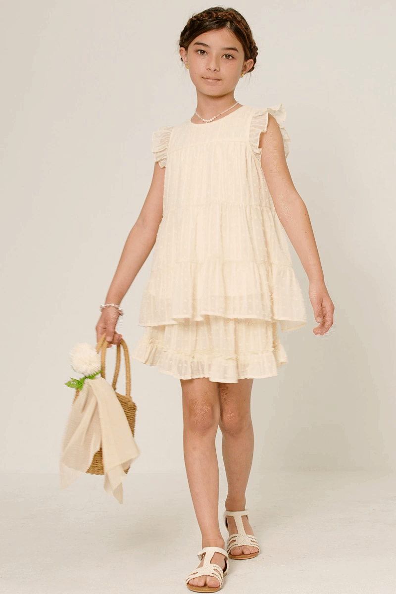 Cream Girls Textured Stripe Swiss Dot Ruffled Tiered Top for wholesale on Faire1