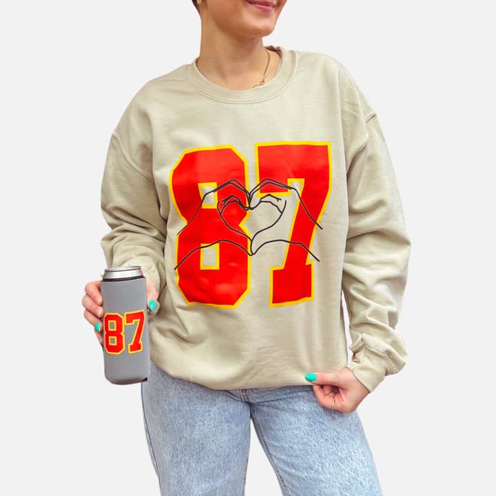 Kelce + Swift 87 Heart Sand Sweatshirt | Kansas City Chiefs for wholesale by Emby Goods