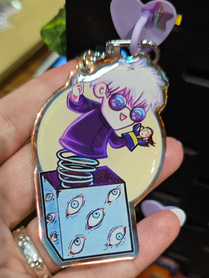 "Gojo in the box" Acrylic Charm by Scribble Creatures for wholesale by Scribble Creatures