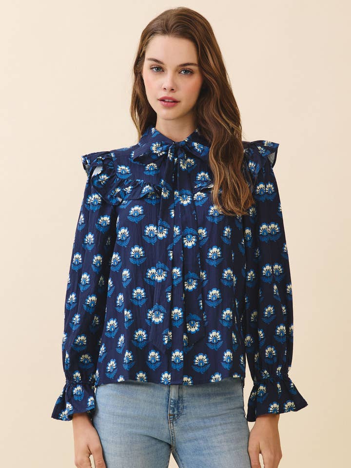 Blouse à boutons avec détails à volants et imprimé floral CT9682 pour la vente par TCEC