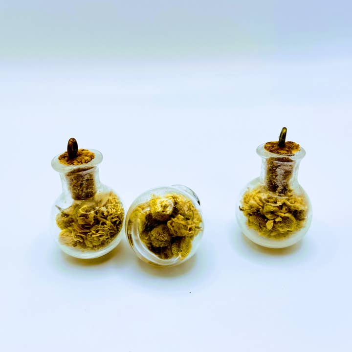 Bottle of dried Chamomile. for wholesale by LilDebby's DeLights