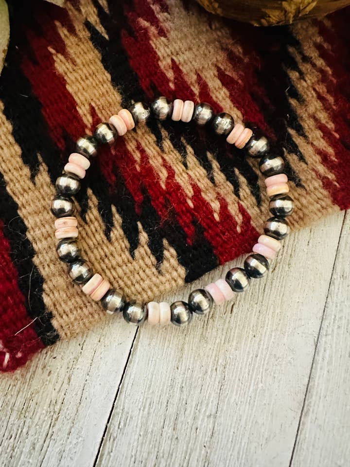 Navajo Queen Pink Conch Shell & Sterling Silver Beaded Stretch Bracelet for wholesale by Nizhonitradersllc