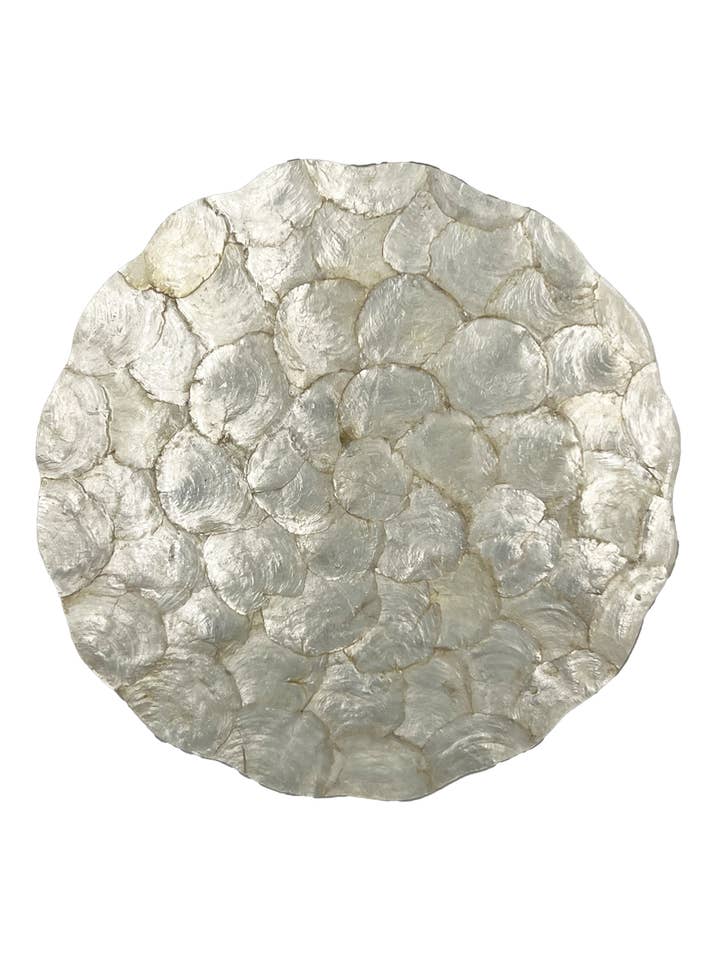 Scalloped Capiz Placemat in Natural for wholesale by Cantiq Living