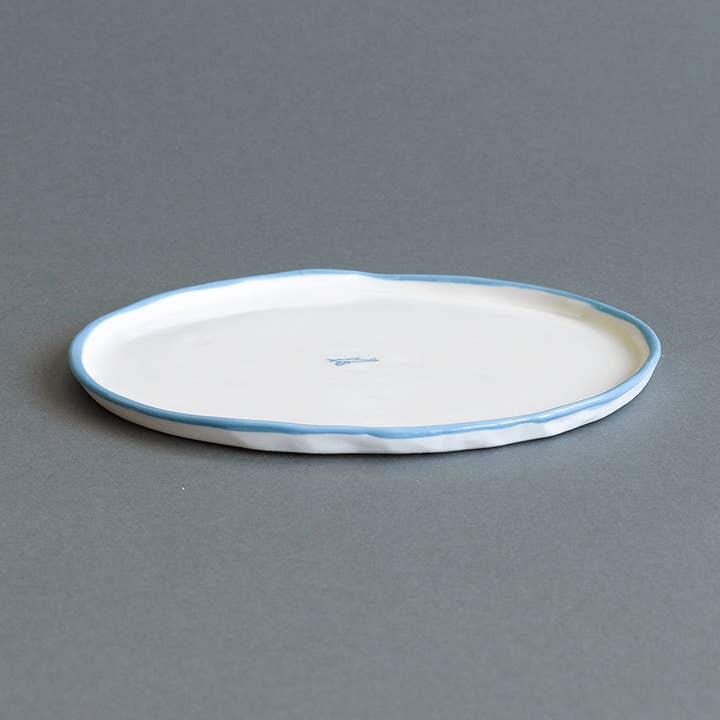 Ceramic Entree Plate - Paper Turquoise Rim for wholesale by Hayden Youlley Design