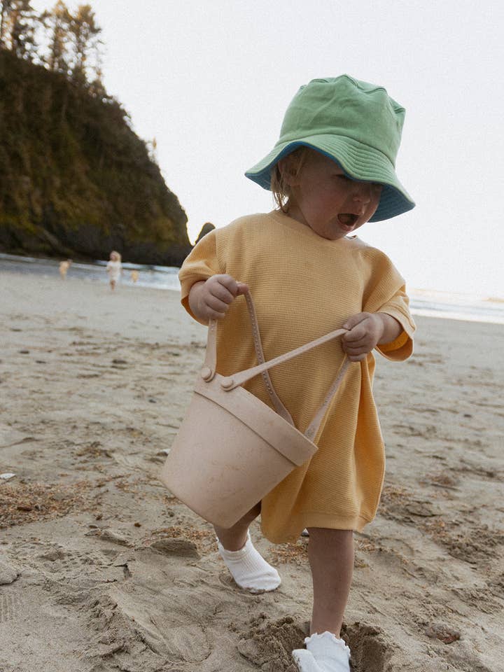 Ezra Romper in Yellow for wholesale by Winnie + Crew