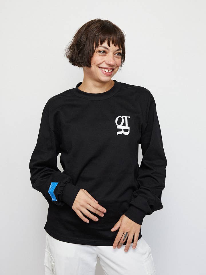 Black "CHANGE YOUR MIND" T-SHIRT for wholesale on Faire