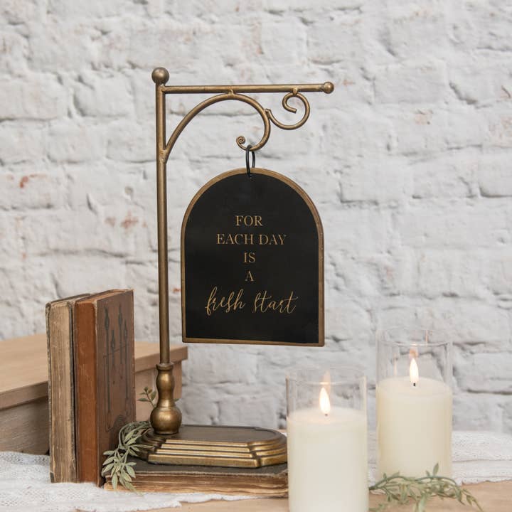 BLACK & GOLD HANGING SIGN ON STAND for wholesale by Ragon House