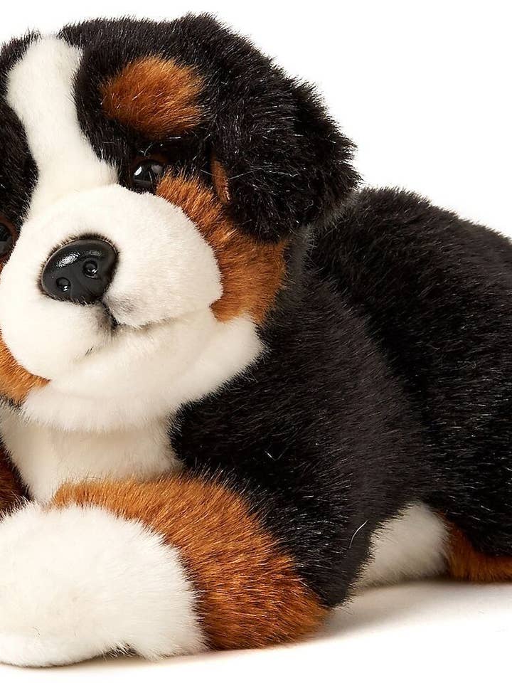 Bernese mountain dog puppy, lying cuddly/plush toy for wholesale by Uni Toys
