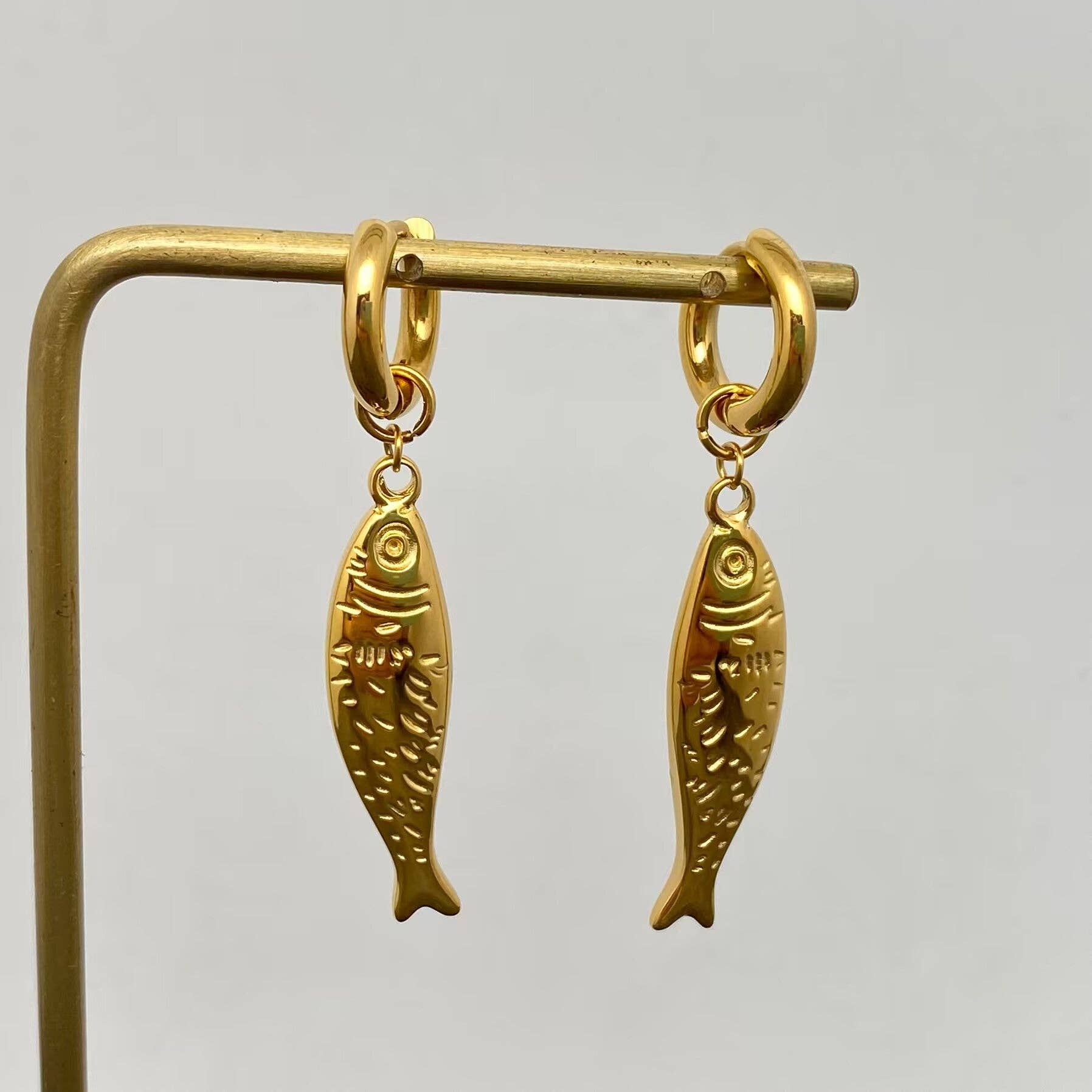 Mio Queena – wholesale Huggie earrings – Fish Charm 18K Gold Plated S.Steel Huggie Earrings - FGS