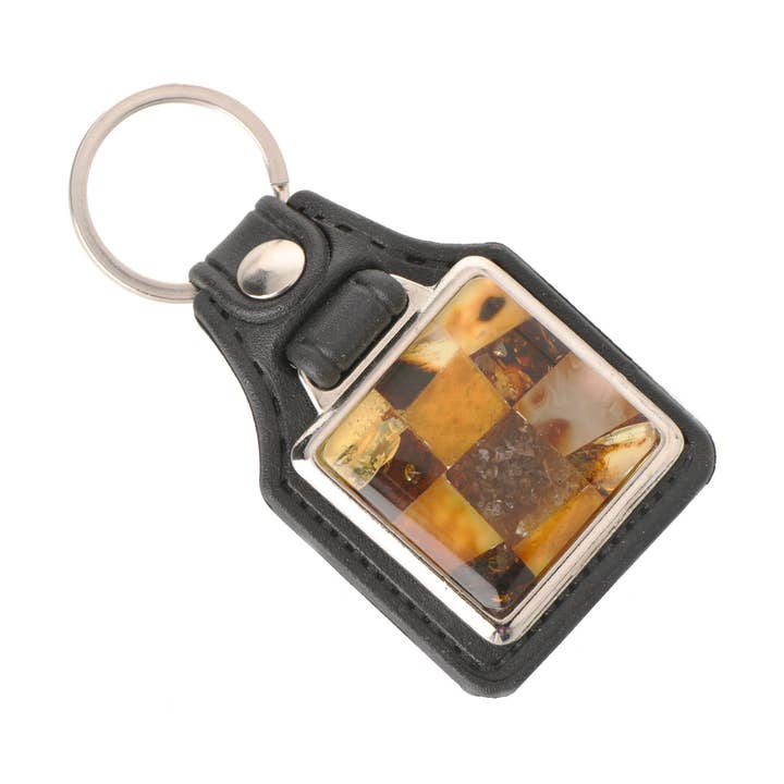 Souvenir portachiavi in pelle ambra baltica per la vendita all'ingrosso da parte di The Natural Amber