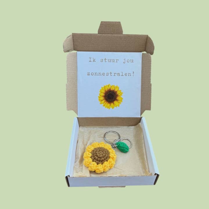 Liten ask med solstrålar nyckelring för wholesale av Sidedish Cards