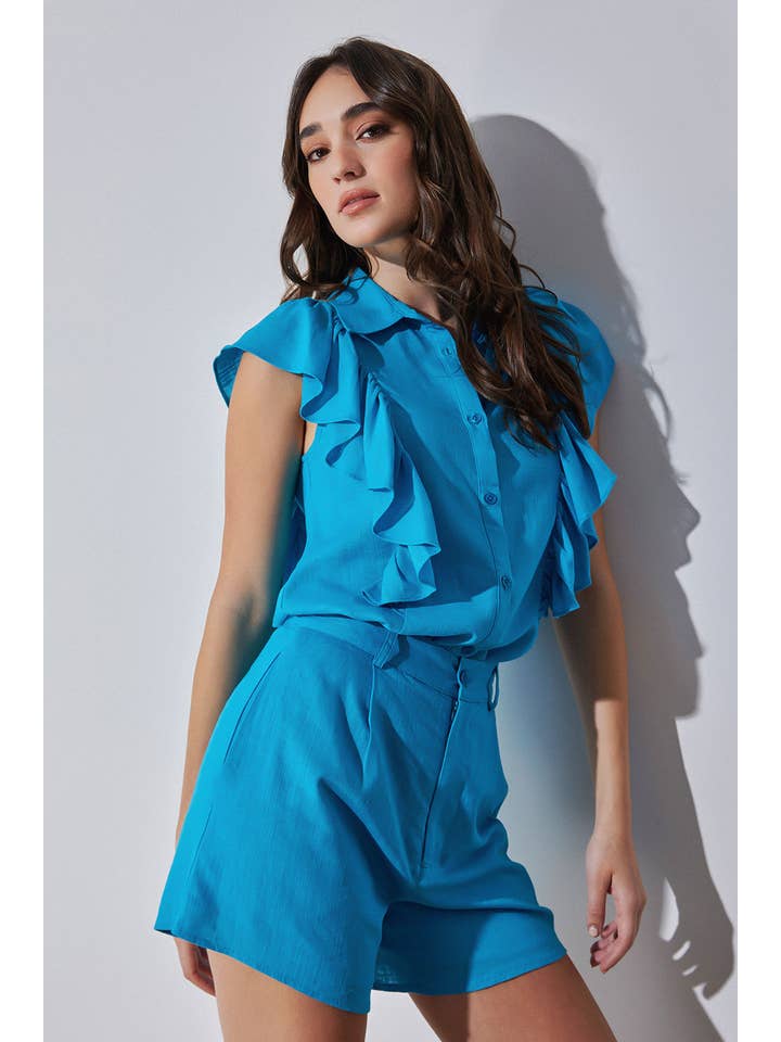 Strut & Bolt - Venta al por mayor Camisa con botones - Mujer - Blusa de lino sin mangas con volantes en los hombros12