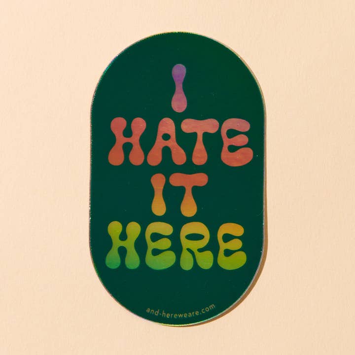 I Hate It Here Holographic Vinyl Sticker - Made in USA - Stocking stuffer, Holiday, Gift Guide for wholesale by And Here We Are