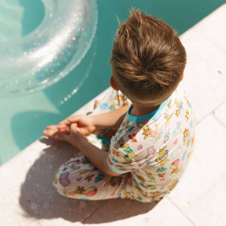 Cream Multi Arthurâ„¢ Family Vacation Bamboo Short Sleeve Kids Pajama Set for wholesale on Faire4