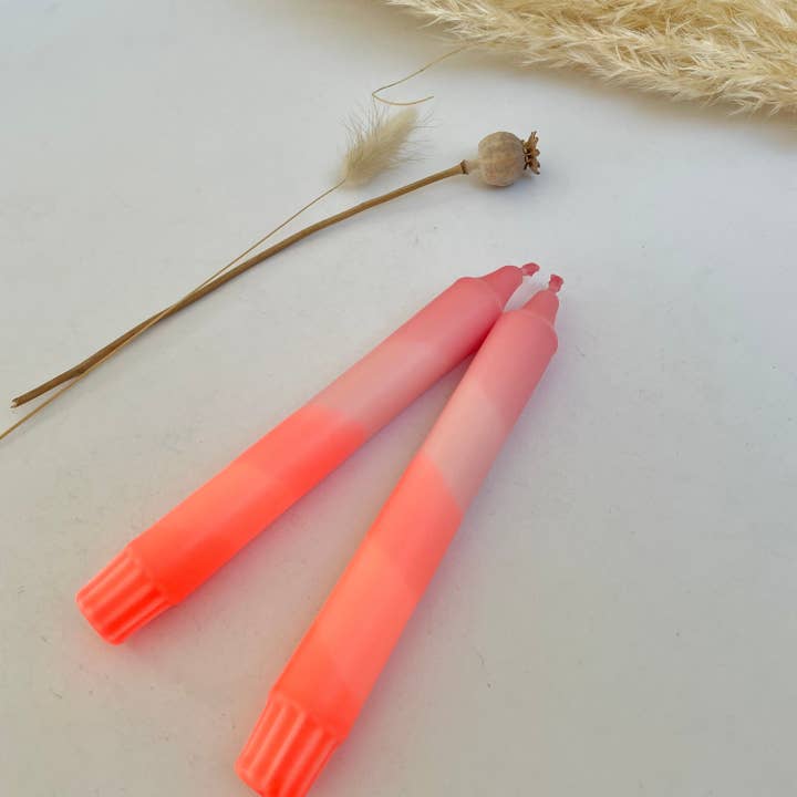 Sherbert Pink and Neon Coral Dip Dyed Dinner Candles for wholesale by The Singing Rabbit