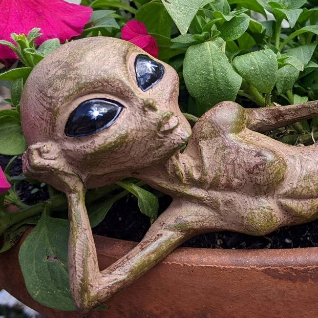 John Bernard & Company - Wholesale Outdoor Ornament/Decor - Alien Invasion Sexy 10” long Lying Female Alien Statue 9