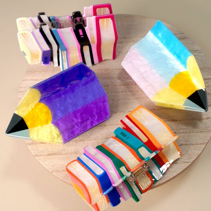 BOOK STACK SCHOOL HAIR CLAW CLIPS | 40H857 and other Purchase Wholesale tri kes wallcovering. Free Returns & Net 60 Terms on Faire trending on Faire.