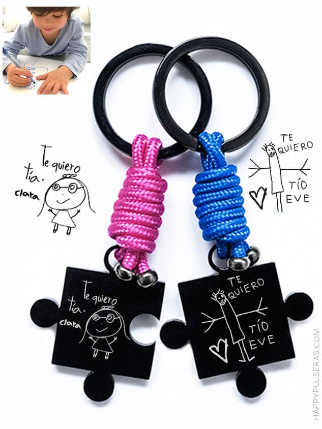 Two-piece black titanium puzzle keyring and nautical cord. for wholesale by Happypulseras