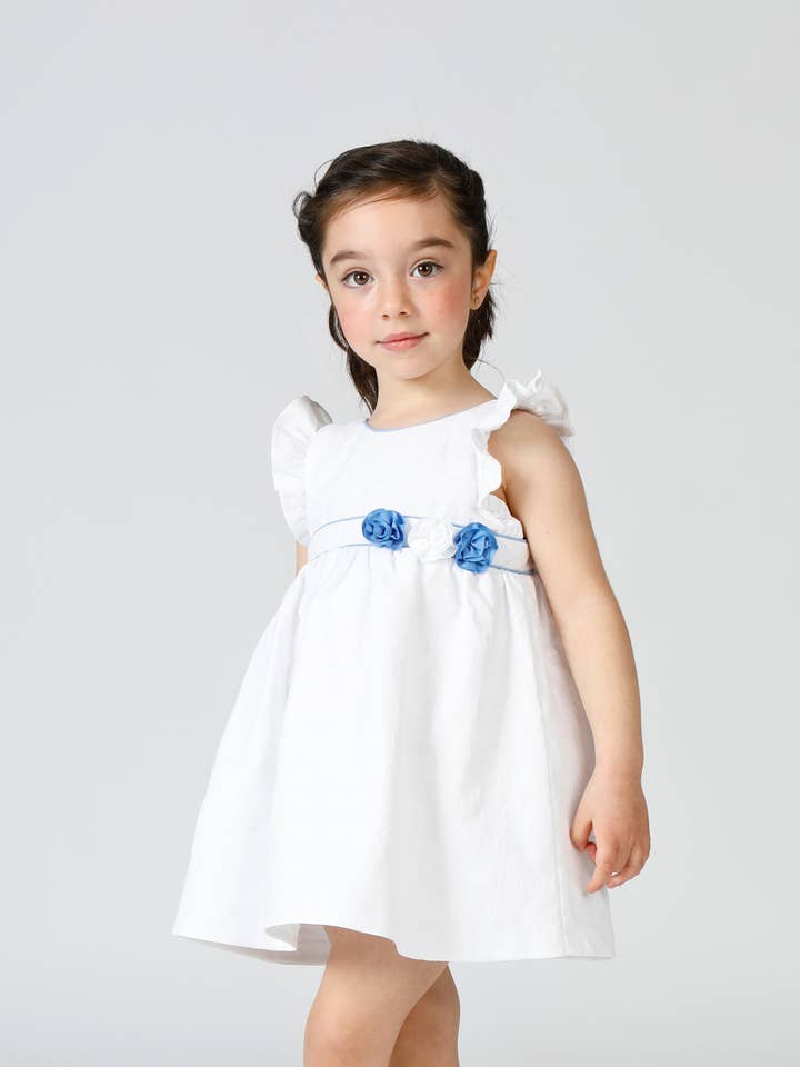 Vestido de bebé blanco con flores azules for wholesale by Charanga