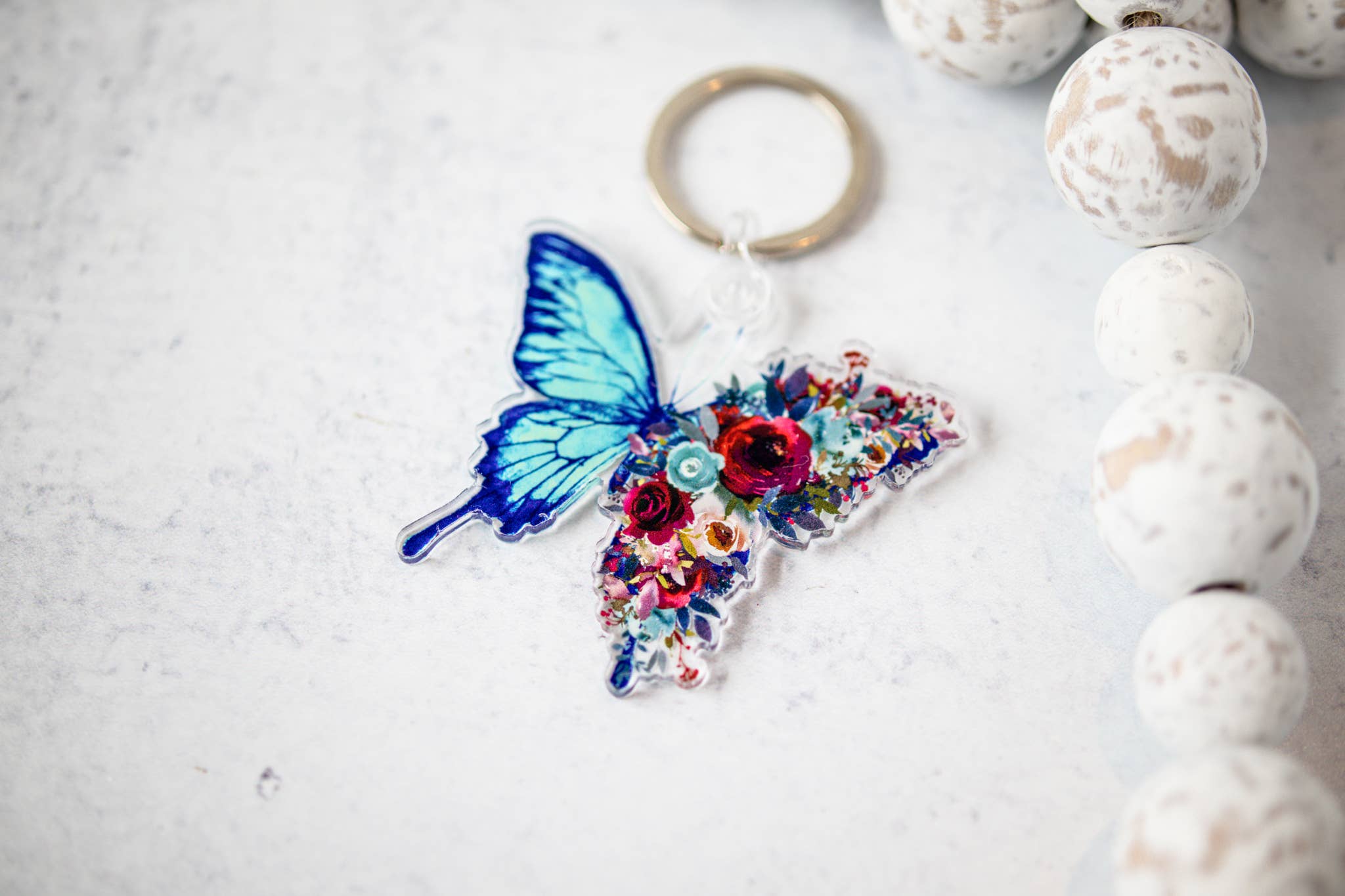 Savannah and James Co - Venta al por mayor Llavero - Mujer - Llavero Mariposa Floral Azul