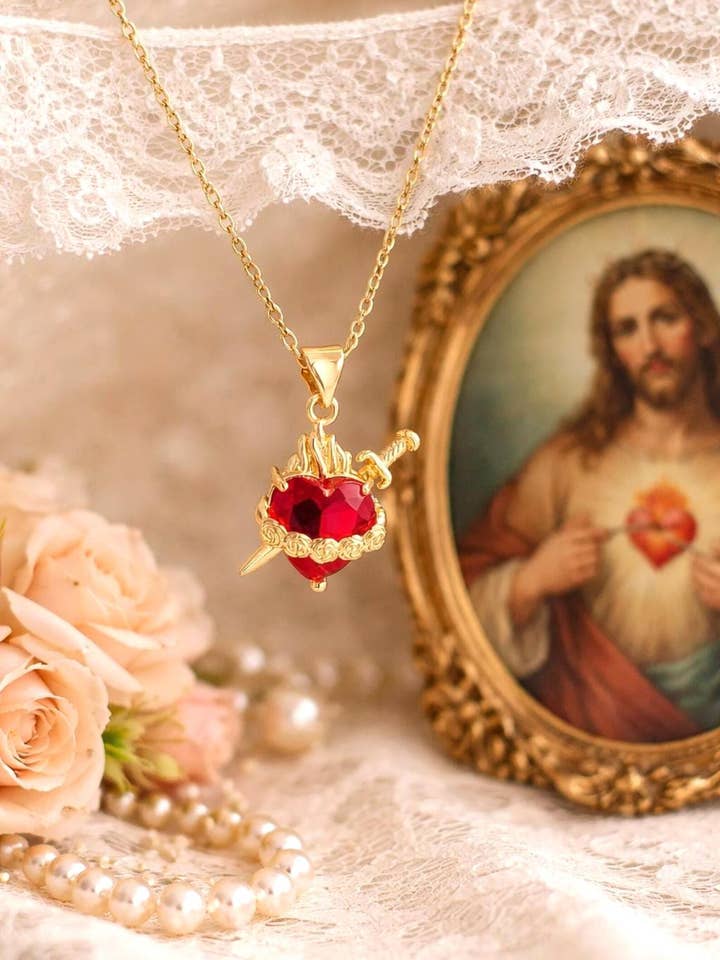Collana con cuore sacro e spada per la vendita all'ingrosso da parte di Wild & Free