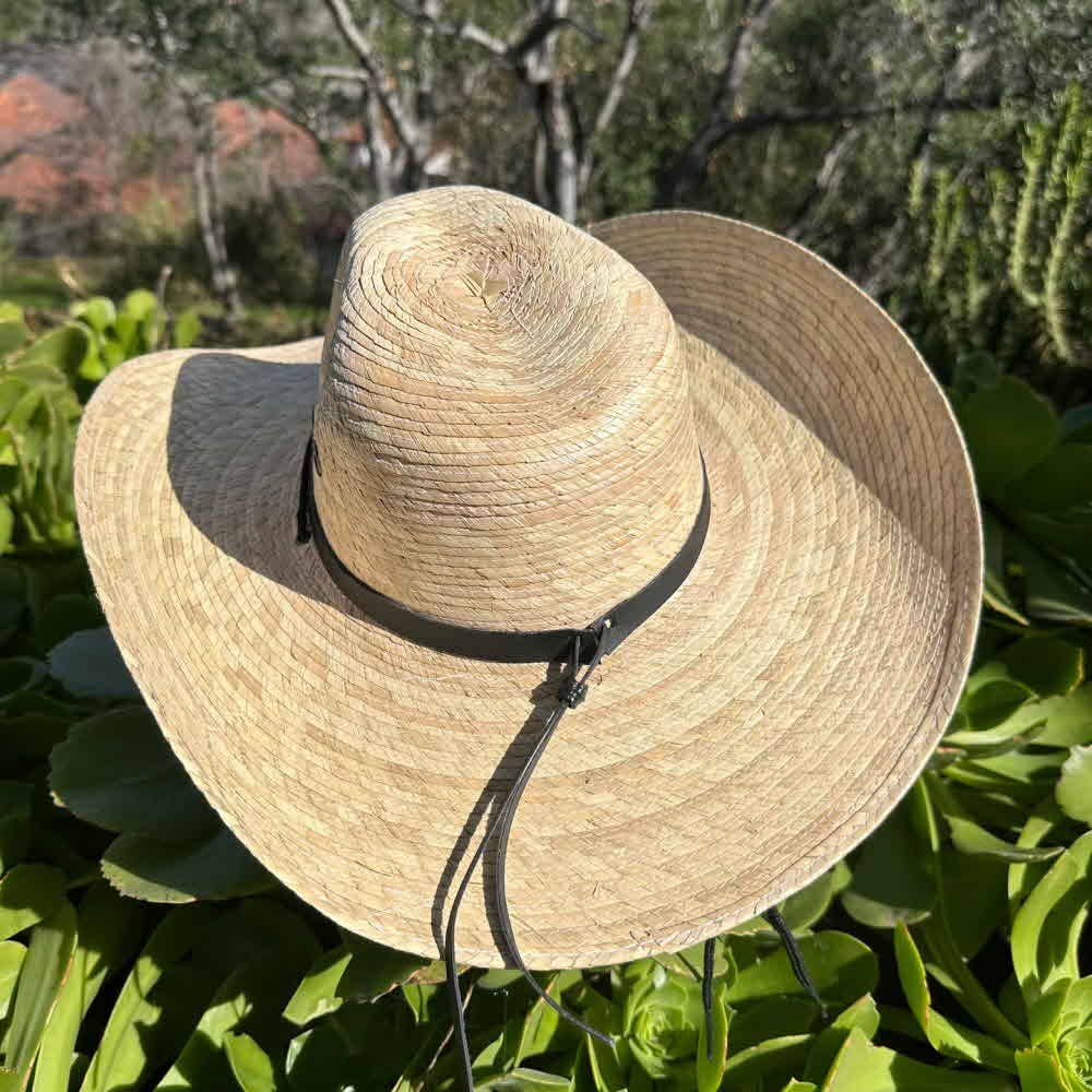 NATURAL fine palm leaf straw Hand made with black woven band Man and for wholesale on Faire1