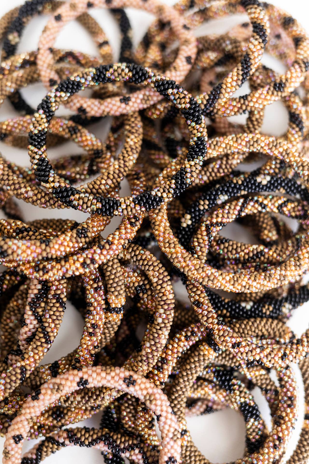 Aid Through Trade - Wholesale Beaded Bracelet - Roll-On® Bracelets - Jaguar Set of 122