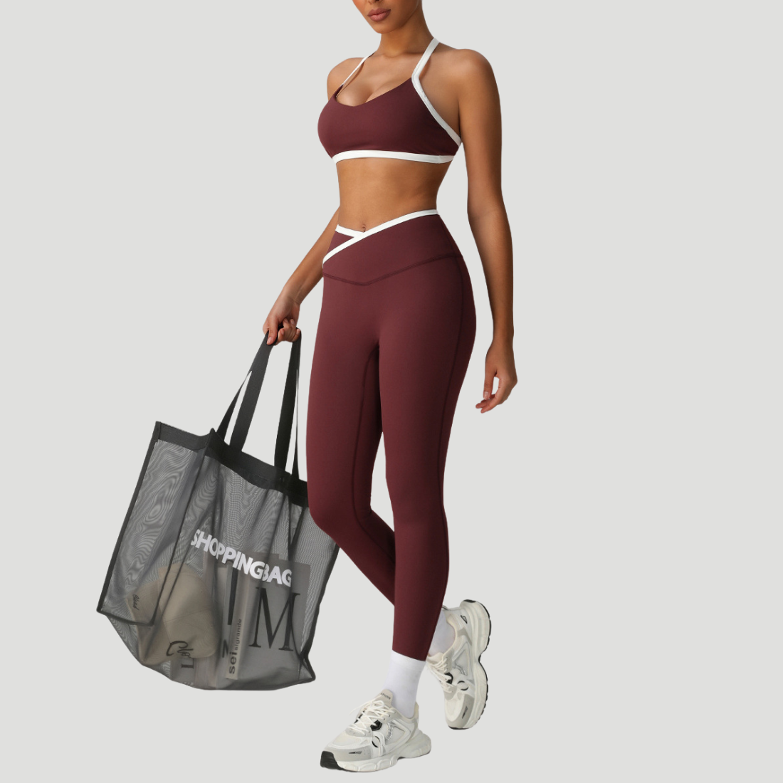 Sodalemon - Vendita all'ingrosso Completo sportivo - Donna - Set due pezzi con reggiseno incrociato e pantaloni sportivi a vita alta3