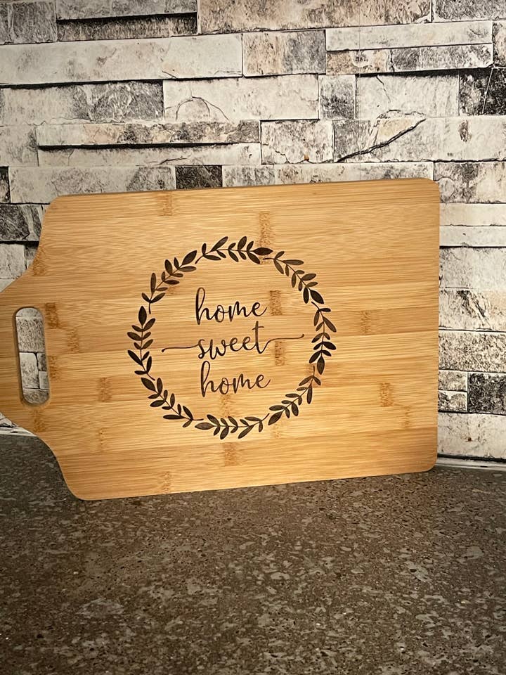 Home Sweet Home bamboo cutting board for wholesale by Squatchin’ Country