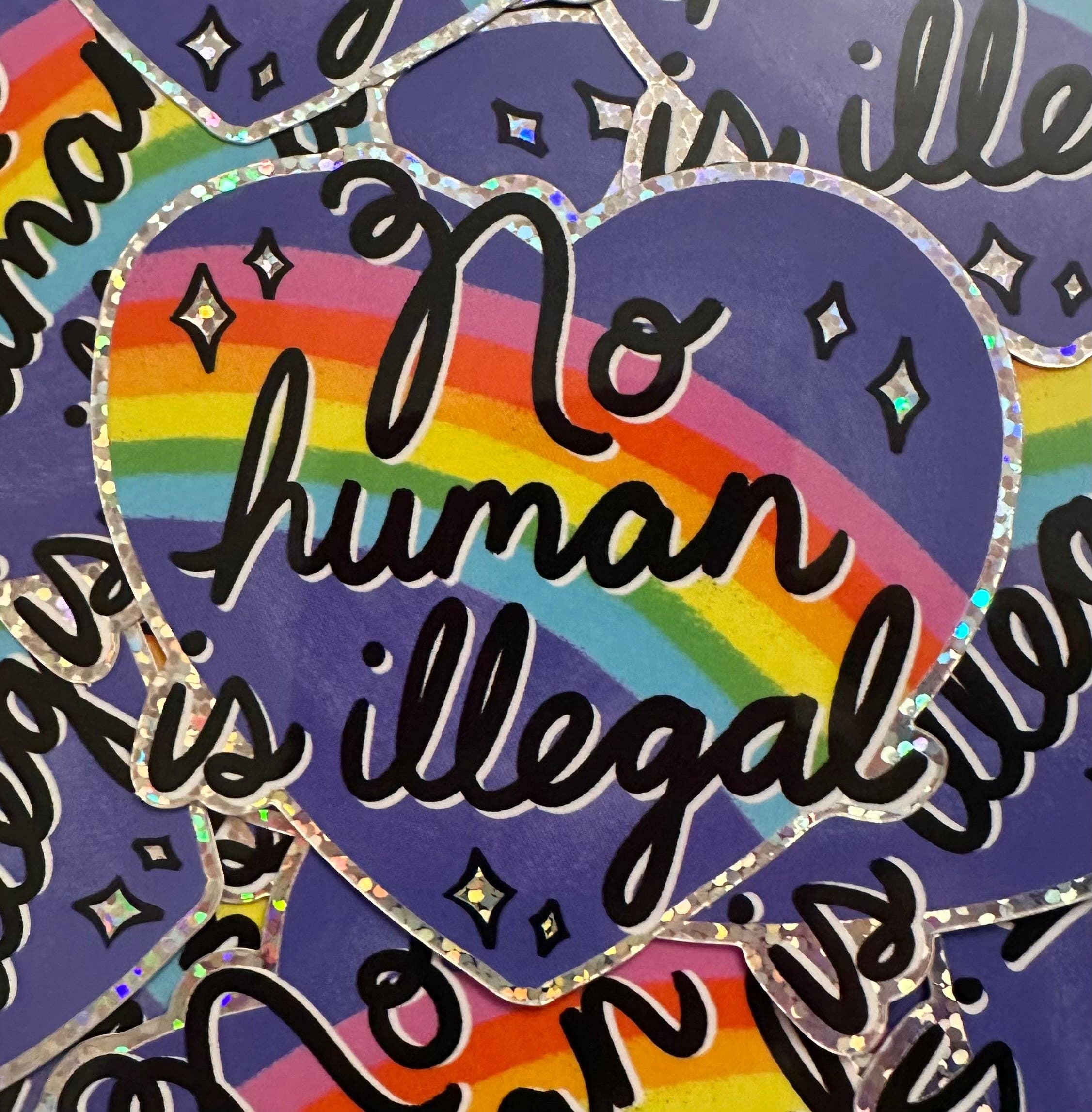 Hilarious Humanitarian - Wholesale Sticker - No Human Is Illegal Glitter Sticker2