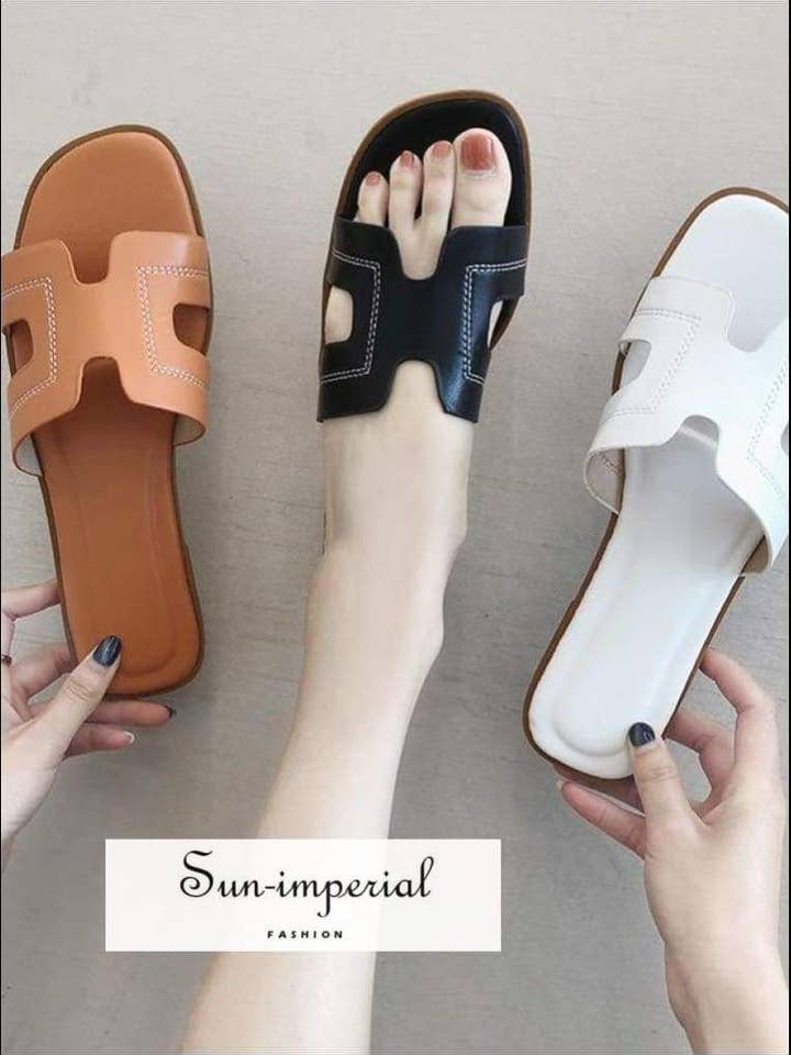 Pantofole piatte estive da donna casual morbide in PU tinta unita per la vendita all'ingrosso da parte di Sun Imperial