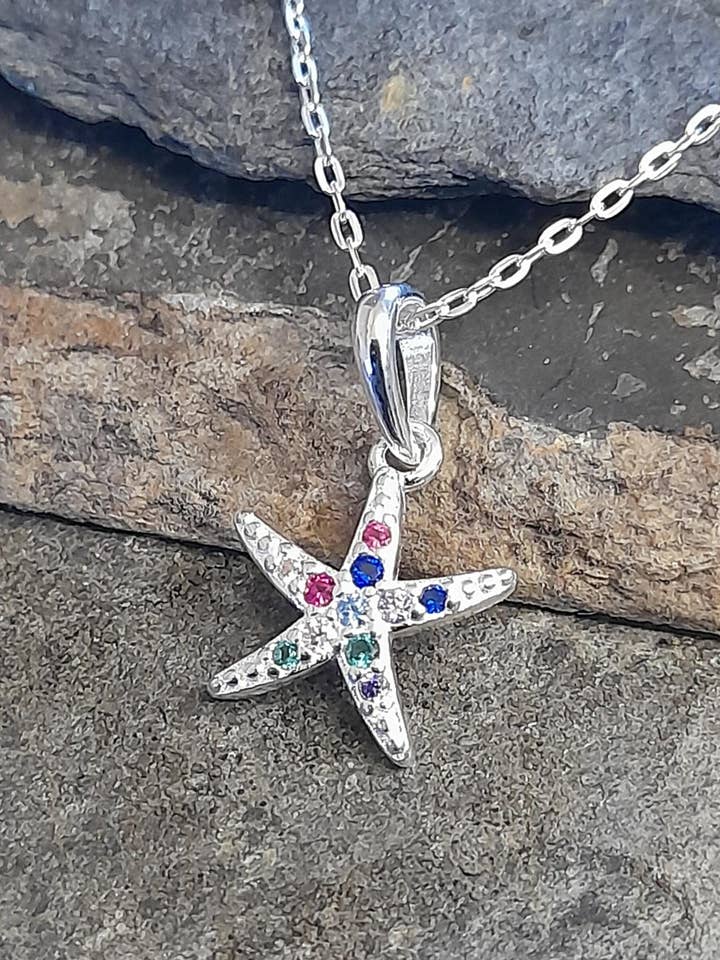 SP496BC - MULTI CZ SØSTJERNEVEDHÆNG 11MM for engroshandel hos Bluelily925silver