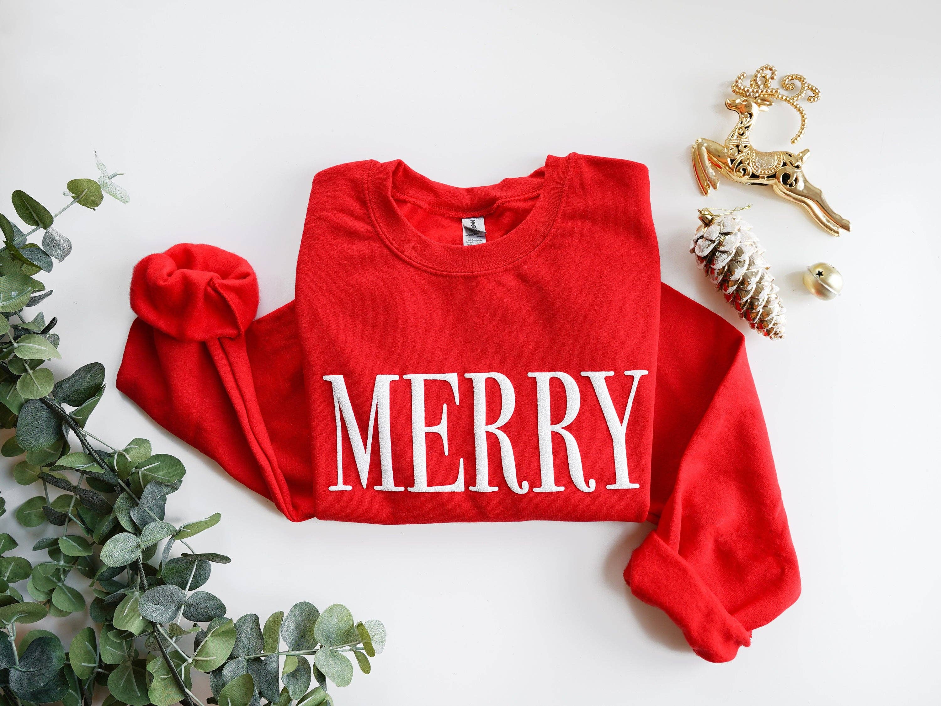 Embossed Red Merry Christmas Crewneck for wholesale on Faire2