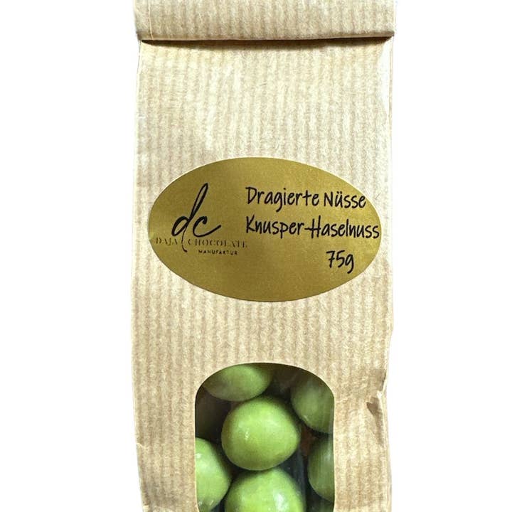 Belagda krispiga hasselnötter, 75g påse för wholesale av Daja Chocolate